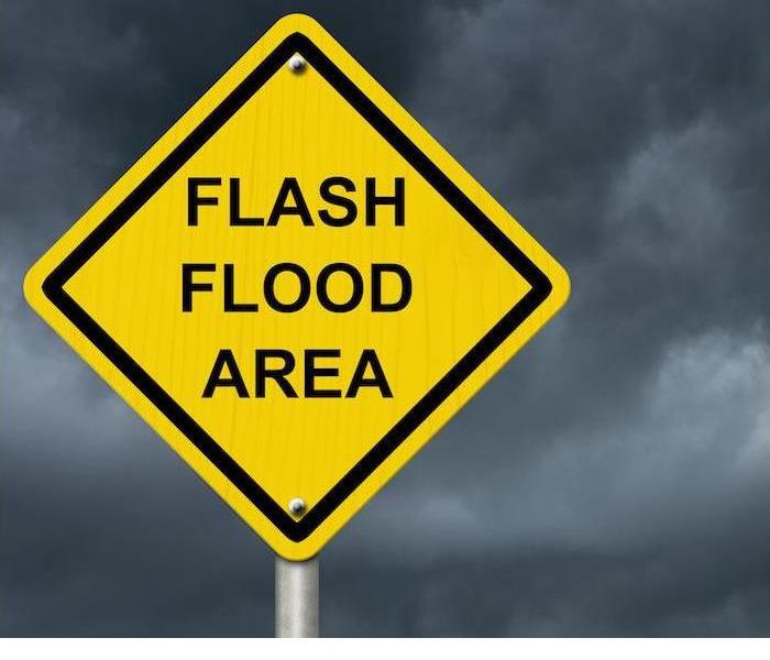 A sign informing people of a flash flood area